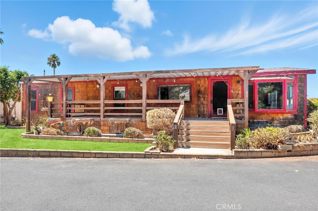 Welcome to this beautiful manufactured home located in the highly sought-after Country Lake 55+ Mobile Home Community in scenic San Jacinto. This spacious 2 bedroom, 2 bathroom residence offers comfort, functionality, and a relaxed lifestyle in a serene setting.
Step inside to find a bright and inviting open-concept layout with a generous living room, a well-appointed kitchen featuring ample cabinetry and counter space. Additional features include an in-unit laundry area and a covered carport. Enjoy morning coffee or evening sunsets from your covered patio, overlooking a low-maintenance yard and peaceful community surroundings.
Country Lake offers fantastic amenities including a clubhouse, swimming pool, spa, walking trails, and a beautiful lake with catch-and-release fishing—all nestled in a quiet, gated community with mountain views.