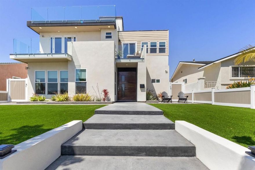 Welcome to your dream home in the heart of Pacific Beach! This stunning coastal masterpiece offers over 3,400 sq ft of thoughtfully designed living space with style, function, and entertaining in mind. Step into an expansive open-concept layout flooded with natural light, ideal for hosting or simply enjoying everyday beachside living. The gourmet kitchen is a chef's dream, featuring a full-size chef-style pantry and premium finishes throughout. Retreat to one of three spacious decks, including a private rooftop deck with breathtaking ocean and bay views-perfect for sunset cocktails or morning yoga. The detached garage offers ADU potential, ideal for quests, a home office, or future rental income. Every inch of this home has been crafted to impress. From its high-end finishes to the unbeatable location just minutes from the sand, this is Pacific Beach living at its finest.
