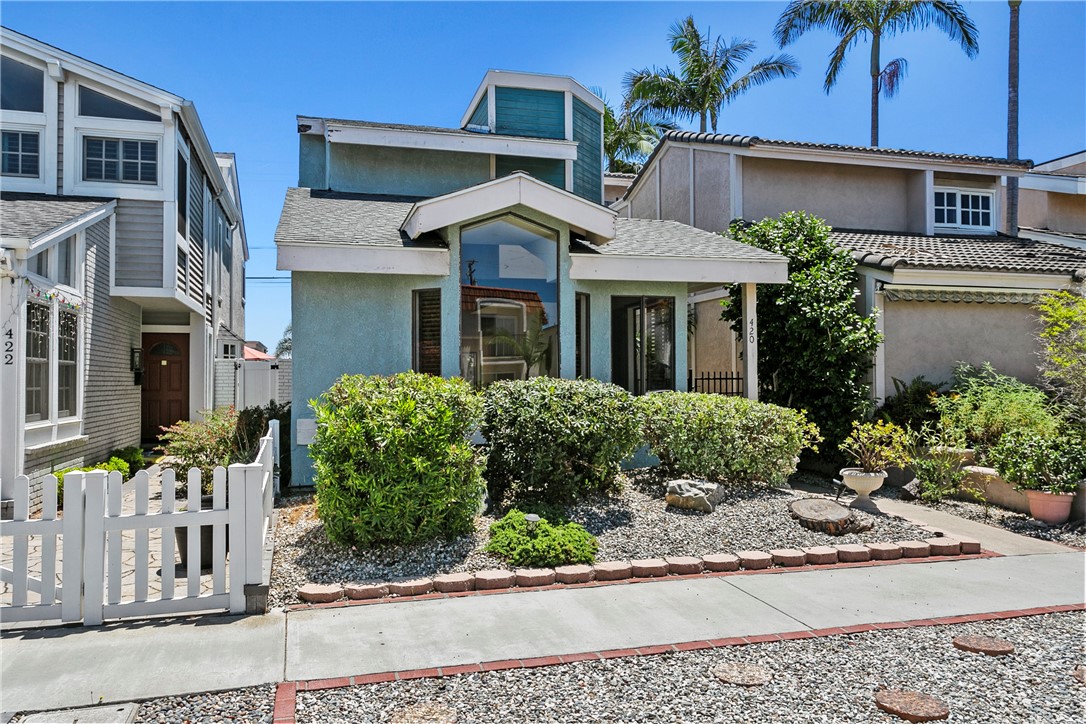 Fantastic LOCATION + fantastic LAYOUT + fantastic POTENTIAL = FANTASTIC OPPORTUNITY! Welcome to this 3 BED, 2.5 BATH + BONUS ROOM home in one of downtown Huntington Beach’s most desirable interior blocks. Google Maps say...just a 7-minute walk to the beach and a 20-minute walk to Main St...but tucked just far enough away from the Main Street buzz. With approximately 2,413 SQFT of living space, this property offers the perfect canvas to create your dream coastal home. The floor plan is thoughtfully designed with DEDICATED SPACES FOR LIVING, DINING, KITCHEN, AND FAMILY. Vaulted ceilings and LARGE WINDOWS in the front living room bring in tons of NATURAL LIGHT, setting the tone for a bright and welcoming space. AN UPSTAIRS BONUS ROOM at the front of the home provides flexible use as a den, office, or guest area… add a window to this room to increase light and value. Upstairs, the PRIMARY SUITE IS ENORMOUS and includes a unique TWO-STEP PLATFORM ideal for a sitting area or reading nook. The primary bathroom features DUAL VANITIES and excellent light. Two additional bedrooms share another LARGE BATHROOM, also with DUAL VANITIES. This makes busy mornings easy-breezy. Convenient UPSTAIRS LAUNDRY and a DOWNSTAIRS POWDER ROOM add practical comfort. Recent updates include a NEWER FLAT ROOF (May 2024), 2012ish for the remainder of the roof, termite work completed (Jan 2024), and well-maintained structural systems, giving you a solid base to build upon. The BACKYARD offers space for outdoor lounging, entertaining or gardening... PLUS the UNIQUE ZERO LOT LINE offers more useable outdoor space AND offers twice the downstairs windows and sunlight of other interior locations. Desirable SMITH ELEMENTARY, DWYER MIDDLE, and HUNTINGTON BEACH HIGH SCHOOLS are all just minutes away AND local favorite, Fiesta Grill and 17th Street Park are an EZ two block walk. Whether you're an investor, a designer, or want to create the home of your dreams, this BLANK CANVAS is your opportunity to own something truly special in the heart of Huntington Beach.