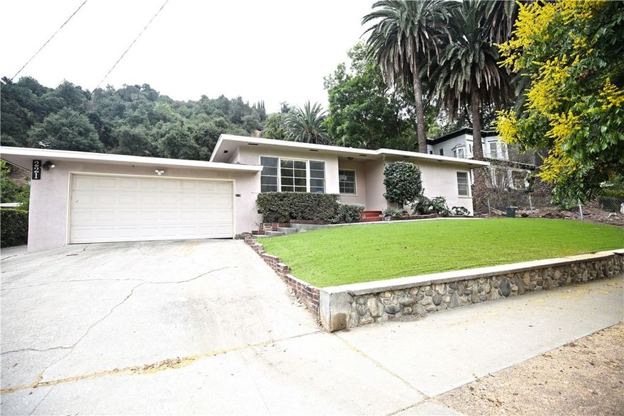 Located in the highly sought-after South Pasadena School District, this charming front unit of a duplex offers both comfort and convenience. The spacious and sun-filled living room features large windows that invite abundant natural light. A dedicated dining area sits adjacent to the kitchen, perfect for everyday meals and gatherings. The bright kitchen has been updated with a new stove, range hood, freshly resurfaced cabinets, and a convenient laundry area. Two well-proportioned bedrooms share a full hallway bathroom. Recent upgrades, including fresh interior paint and newly installed vinyl flooring, add to the home’s appeal. Large backyard is perfect for relaxing. Additional highlights include a one-car garage shared with the neighbor, driveway parking, and an unbeatable location close to Trader Joe’s, the local elementary school, Freeway 110, and the Metro Gold Line Station for easy commuting.