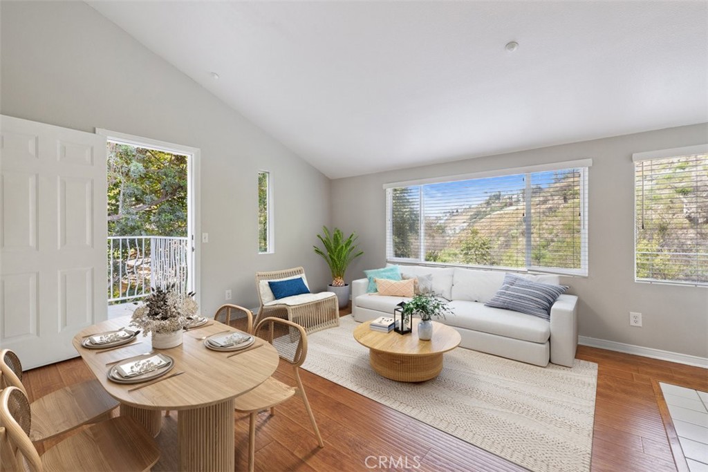 Welcome to beautiful Las Flores Canyon where the most spectacular private Townhome awaits. A secluded entry around the back of a 4-unit building with it's own private patio which looks out towards the oak trees, mountains and seasonal stream. As you walk through the door you will see stairs that lead you up to the main floor but on the first floor there is a bedroom suite with private bath and walk in closet. Upstairs you will enjoy a large living space and kitchen that looks out over the tops of the trees to the mountains along with a balcony to enjoy the ocean breeze. The large family room has a lovey fireplace for those chilly winter nights. Also upstairs you will find another bedroom and full bath. Enjoy the close proximity to everything Malibu has to offer. Just a 10 minute drive to Pepperdine University, the country mart and so much more. Living next to the mountains with million dollar views and the ocean doesn’t get better than this.