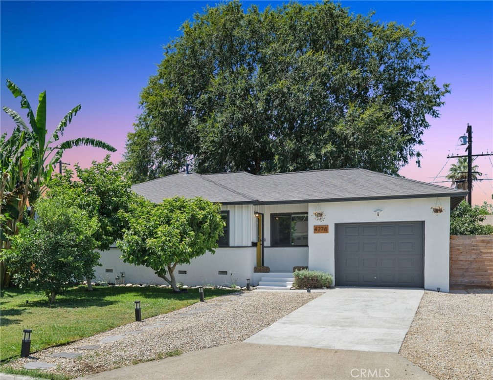 Timeless traditional-style 1950s home in Riverside’s Ramona neighborhood. This centrally located neighborhood on Riverside’s western edge is close to award winning schools, California Baptist University, restaurants, markets, and short drive to the 91 Freeway for commuters and weekend getaways. This well appointed 2 bedroom, 1 bathroom home is about 900 square feet, has a one car attached garage, a spacious lot (.15 acres), and mature fruit trees including: avocado, banana, fig, lime, loquat, nectarine, peach, pink and white guava, and plum. The home has been well maintained and has laminate and wood flooring, fresh paint, shaker door cabinets, granite counters, and newer dual paned windows. The kitchen opens to the living and dining rooms providing for an inviting space that is simple, functional and full of natural light. The sellers are including the appliances which include a gas range, refrigerator, washer, and dryer. The backyard offers plenty of space for creating your own garden, play area for kids, or running room for your favorite four-legged friend. The owners have made recent investments in a new roof, water softener, and smart home features including video doorbell, alarm system, keyless entry, and smart thermostat. This quaint home provides an excellent value for a first time home buyer, empty nester, or someone looking to invest in a University adjacent neighborhood.
