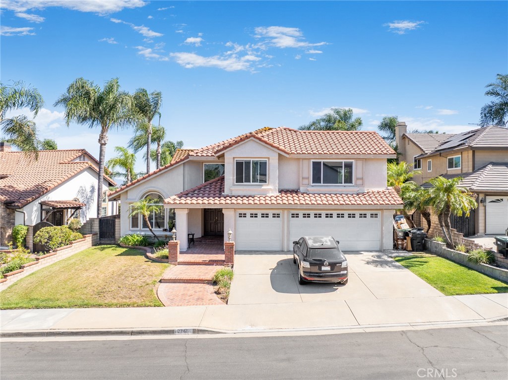 Location! View! Remodeled! Located in one of Chino Hills’ most desirable neighborhoods, this beautifully upgraded property with 4 bedrooms, 3 bathrooms, (1 bedroom 1 bathroom downstairs) plus a bonus room upstairs, 3-car garage. With 3,017 sqft of elegant living space on a 7,187 sqft lot. From the moment you step through the grand double-door entry, soaring high ceilings and abundant natural light set the tone for a bright, open-concept layout designed for both comfort and style. Totally modernized kitchen featuring white cabinets, quartz counter tops, center island with waterfall finish, stainless-steel appliances. Family room with mini bar and fireplace framed with tiles. Large primary bedroom with retreat area. Primary bathroom with dual sinks, freestanding bathtub, separate shower with frameless glass enclosures. The upstairs spacious bonus room is perfect space for a home office, media room, or potential fifth bedroom. All the other bathrooms also fully renovated. Other features include: new interior paint, tiles at entry, kitchen and bathrooms, recessed lights, custom chandeliers, newer double-pane windows and sliding door, custom window roller shades.
Step outside to a private backyard oasis where a covered patio, sparkling pool & spa, and unobstructed mountain and city light views create the ultimate setting for entertaining or peaceful retreat. Enjoy a rare combination of scenic beauty and everyday convenience—nestled just steps away from Rolling Ridge Elementary, Canyon Hills Junior High, local parks, and shopping centers. Homes with this level of finish, space, and location rarely come available. Don’t miss this exceptional opportunity to own a turnkey residence in the heart of Chino Hills.