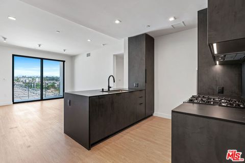 Photo of 3688 Overland Ave #PH21, Los Angeles, CA 90034 (MLS # 25617213)