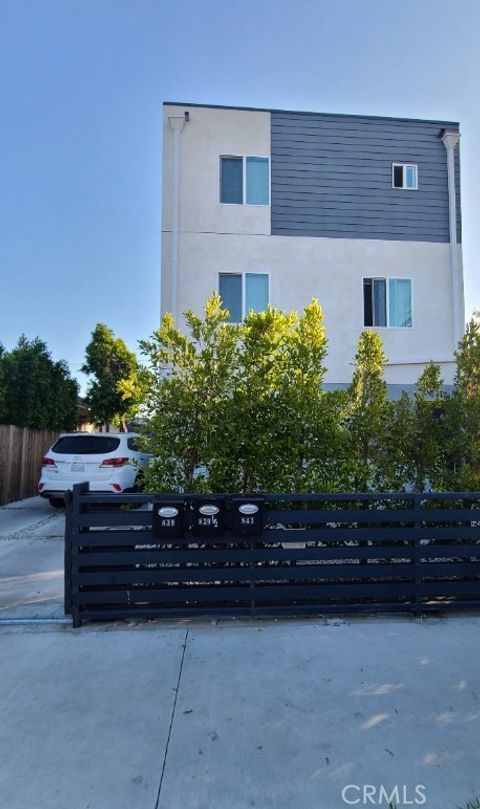 Photo of 839 E 32nd St, Los Angeles, CA 90011 (MLS # PW26082435)