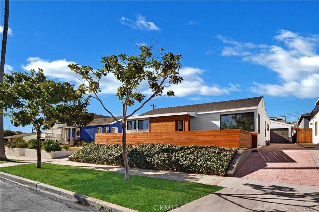 Discover coastal living at its finest in this inviting 3-bedroom, 2-bath 1940's beach bungalow redesigned and remodeled top to bottom including NEW interior finishes, NEW backyard landscaping, and NEW roof. Ideally located in Dana Point’s highly sought-after Lantern District. Just moments from the harbor, local boutiques, and renowned dining, this home blends charm, comfort, and convenience in one of Orange County’s most vibrant seaside communities. Step inside to find a bright and airy floor plan with sun-filled living spaces and timeless coastal finishes. The contemporary kitchen features ample counter space, modern appliances, and easy flow to the dining/living area perfect for casual meals and entertaining. A relaxing primary suite provides comfort and privacy, while two additional bedrooms provide convenience for family or guests. The outdoor spaces are designed for effortless beachside living. Enjoy ocean breezes from the front porch or host gatherings in the private backyard retreat with lush landscaping and room for al fresco dining. A detached garage and driveway provide added functionality. Whether you’re searching for a full-time residence or a weekend getaway, this home offers the quintessential Dana Point lifestyle—steps from the beach, harbor, and the charm of the Lantern District.