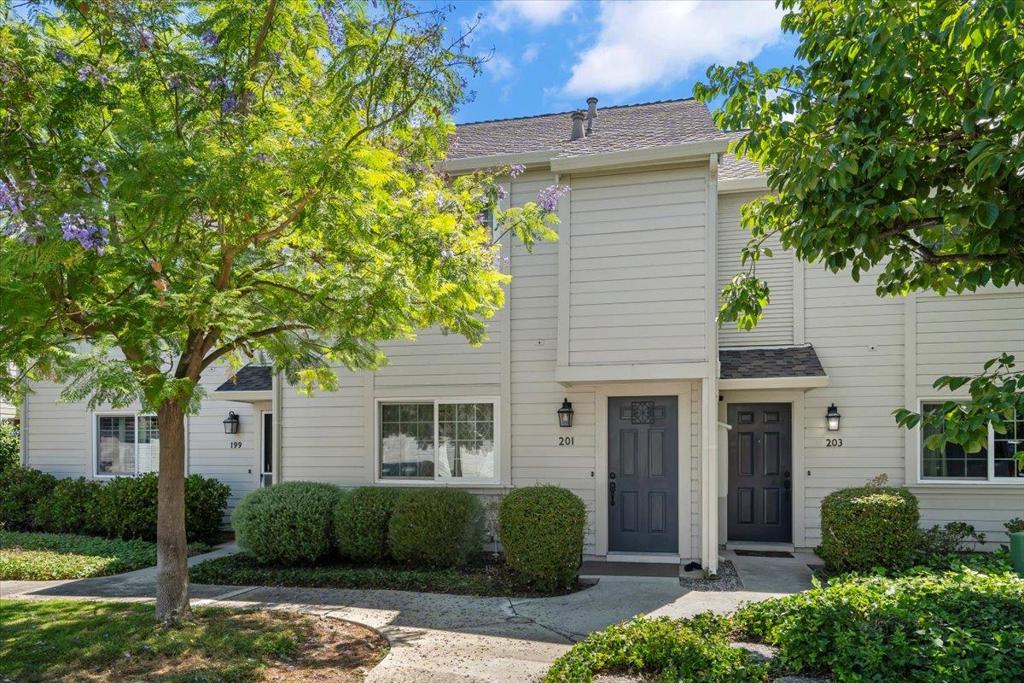 Welcome to 201 Shelley Avenue, Campbell - a bright, 3-bedroom, 2.5 bath condo ideally situated in the heart of Silicon Valley. An open-concept living and dining area is bathed in natural light, anchored by a cozy fireplace, recessed lighting, and flows seamlessly to a private back patio perfect for morning coffee or evening entertaining. The kitchen showcases granite countertops, stainless steel appliances and an adjacent in-unit laundry for everyday convenience. Upstairs, the spacious primary suite offers an updated dual sink vanity and generous walk-in closet, while two additional bedrooms and a full bath provide versatility for guests or a home office. Additional highlights include neutral carpeting, a 1-car garage plus a dedicated parking spot and ample visitor parking. Commuter friendly to highways 85, 17 and 880 and just minutes from Apple, Nvidia, Netflix and downtown Campbells shops and restaurants. Don't miss your chance to own this peaceful Silicon Valley retreat!