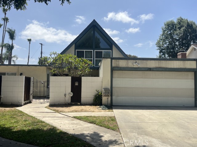 Secluded cul-de-sac location in quiet neighborhood; Main floor master bedroom w/ private dressing area, closet and attached upgraded bathroom featuring frameless shower; Two other ground floor bedrooms w/ shared full bath; HUGE upstairs retreat with new luxury hardwood vinyl tile flooring, ceiling fan, spacious closets and attic storage could be entertainment room, bonus room or even master bedroom (however, no bathroom upstairs);; Remodeled kitchen w/ granite countertops, 'granite' double sink & appliances (including chef quality stove and oven), wood cabinetry, pantry and built-in breakfast bar; Video surveillance system with split screen monitor and cameras(no monitoring cost required); Brand new energy efficient double pane windows and sliding doors; Separate formal dining room; living and family rooms (featuring sliding glass doors to back yard, newer wide plank laminate flooring and a cozy fireplace); Abundant closets and storage space; Vaulted Ceilings & recessed lighting; Well landcaped home with automatic sprinkler system, garden area and a variety of plants and fruit trees; VERY private; Two storage sheds; A/C in downstairs living area and central heating; Spacious driveway leading to attached two car garage with ample storage space & laundry hook-ups (washer & dryer available);