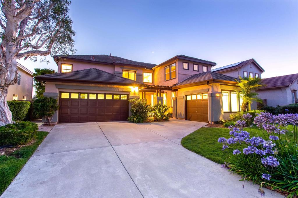 Located in the sought-after neighborhood of seaside estates in Carlsbad, this stunning 5-bedroom, 3-bathroom home offers a perfect blend of luxury, comfort, and modern living. Boasting expansive, light-filled spaces and ocean views, this property is a true gem. As you enter, you are greeted by an open, bright floor plan that flows from one space to the next. The heart of the home is the gourmet kitchen. Featuring a spacious layout with high-end appliances and an abundance of cabinetry, this kitchen offers both functionality and elegance. A generous walk-in pantry provides ample storage for all your culinary needs, while the island offers plenty of prep space and doubles as a gathering spot for family and friends. The main level is thoughtfully designed with convenience in mind, including one of the five bedrooms—perfect for guests, a home office, or multi-generational living. Upstairs, the generous master suite offers beautiful ocean views. The accompanying en-suite bathroom includes a large walk-in closet, dual vanities, a soaking tub, and a walk-in shower, ensuring both relaxation and privacy. In addition to the master, there are three more spacious bedrooms upstairs. Three full bathrooms (one downstairs and two upstairs) ensure ample space for everyone in the household. Outside, the professionally landscaped yard provides the ideal setting for both relaxation and entertaining. Enjoy the coastal breeze as you cook a meal on the built-in BBQ grill on the backyard patio. With ocean views from the second floor, this home offers an incredible backdrop for outdoor gathering. Featuring a spacious layout with high-end appliances and an abundance of cabinetry, this kitchen offers both functionality and elegance. A generous walk-in pantry provides ample storage for all your culinary needs, while the island offers plenty of prep space and doubles as a gathering spot for family and friends. The main level is thoughtfully designed with convenience in mind, including one of the five bedrooms—perfect for guests, a home office, or multi-generational living. Upstairs, the generous master suite offers beautiful ocean views. The accompanying en-suite bathroom includes a large walk-in closet, dual vanities, a soaking tub, and a walk-in shower, ensuring both relaxation and privacy.In addition to the master, there are three more spacious bedrooms upstairs. Three full bathrooms (one downstairs and two upstairs) ensure ample space for everyone in the household. Outside, the professionally landscaped yard provides the ideal setting for both relaxation and entertaining. Enjoy the coastal breeze as you cook a meal on the built-in BBQ grill on the backyard patio. With ocean views from the second floor, this home offers an incredible backdrop for outdoor gatherings or quiet moments of reflection. Car enthusiasts will appreciate the property's dual garages, including a double garage and a single garage, both featuring newly installed epoxy floors for a sleek, modern finish. Located within walking distance to the scenic Poinsettia Park and highly regarded Pacific Rim Elementary School, this home is ideally positioned for those who appreciate an active lifestyle and top-tier educational opportunities. With its prime location, gorgeous views, and exceptional layout, this coastal sanctuary is an ideal place to call home.