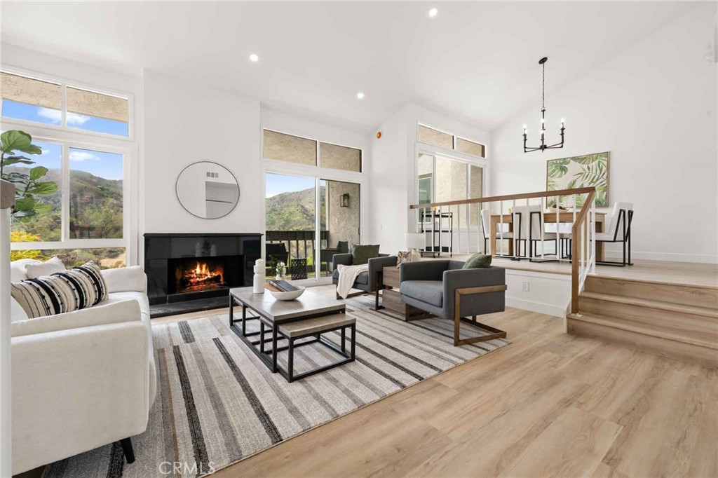 Experience coastal living at its finest in this fully renovated 2-bedroom, 2.5-bath end-unit townhouse in the heart of Pacific Palisades. Boasting 1,568 square feet of elegant living space, this rare gem offers breathtaking views and a floor plan that maximizes both comfort and privacy. Downstairs, you’ll find two spacious bedrooms, including a primary suite with a bathroom and ample closet space. The second bedroom is equally inviting, perfect for guests, a home office, or additional family members. Upstairs, an open concept living and dining area is filled with natural light and designed for entertaining, complete with a sleek modern kitchen and access to a private balcony with stunning views of the surrounding hills. As an end unit, the home enjoys extra privacy and quiet, while the community offers exceptional HOA amenities including a pool, spa, clubhouse, and more. Don’t miss this opportunity to own a turnkey townhouse in one of L.A.’s most coveted neighborhoods.