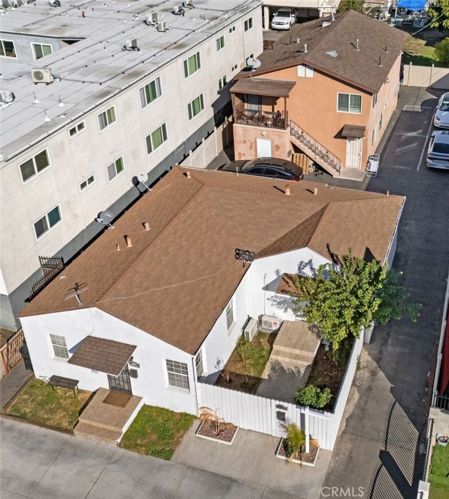 Excellent investment opportunity! This fourplex offers the perfect blend of character, comfort, and modern updates. The rear duplex (2 + 2) was built in 2015, while the two front units (1 + 1) were originally constructed in 1939, with one thoughtfully remodeled. Each unit is separately metered for gas and electricity, and the property includes an on-site laundry room for added tenant convenience. One unit has been beautifully updated, featuring new flooring, fresh interior paint, recessed lighting, a bright kitchen with shaker cabinets and quartz-style counters, a modern tiled bathroom, and a private gated yard—perfect for entertaining or enjoying a morning cup of coffee. Recent upgrades include fresh exterior paint on the front building and other property improvements that enhance curb appeal and long-term value. Conveniently located near LA Valley College, NoHo West, and major freeways, this property sits in a high-demand rental area with consistent occupancy and strong tenant appeal. An outstanding opportunity to own an income-producing property in a highly desirable North Hollywood location.