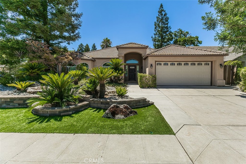 Newly Remodeled Granville Home in NE Fresno!
Located on a desirable corner lot near the Woodward Park Library, top-rated Clovis schools, shopping centers, and popular restaurants, this stunning Granville, Hartford floor plan home offers the perfect blend of luxury and convenience.
Step inside to find fresh interior paint, new plush carpet in the bedrooms, and beautiful vinyl flooring throughout. The spacious Great Room features a cozy fireplace, ideal for gatherings and everyday living.
The beautiful kitchen boasts granite countertops, a built-in desk, a walk-in pantry with custom storage organizer, perfect for the organized chef. The primary suite is a true retreat, complete with a walk-in closet with organizer, a dual-sided fireplace, and a luxurious en-suite bathroom featuring a two-person jetted tub, stone countertops and backsplash. New shower enclosure and sliding glass door.
Step outside to your private backyard oasis, featuring a sparkling swimming pool, covered patio, and lush mature landscaping perfect for entertaining or relaxing after a long day.
Contact us today to schedule your private showingthis stunning home won't last long!