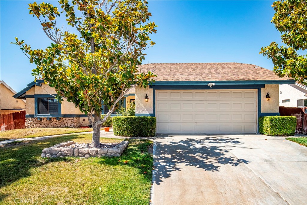 Photos coming soon-Located in a prime area of West Lancaster, this 3-bedroom, 2-bath single-story home sits minutes from the freeway, shopping centers, and everyday conveniences. Whether you're looking for your first home or an investment this one checks the boxes. The front yard is clean and well-maintained with mature trees offering natural shade and privacy. A concrete walkway leads you through the entryway directly into the living room, where you'll find a cozy fireplace and sliding doors opening to the backyard. The kitchen sits just off the living room with ample great amount of space, additional built-in shelving for pantry storage, and room for a dining table. All three bedrooms are located on the left side of the home, including two front-facing guest rooms and a larger master bedroom toward the back with his-and-hers closets and a private en-suite bath. Two hallway closet offers extra storage space for coats, linens, or daily essentials. The backyard is a standout with a side yard, concrete pathways, mature trees, and a separate gated dog area. There's also plenty of space for creative landscaping or future upgrades. A 2-car garage offers significant space with added overhead storage using '' attic style'' space. Priced accordingly and packed with potential in a highly desirable location. *Text or Call Agent Nancy 661.810.5225 for your private showings. HOME QUALIFIES FOR DOWNPAYMENT ASSISTANCE PROGRAMS* zero down options available.
