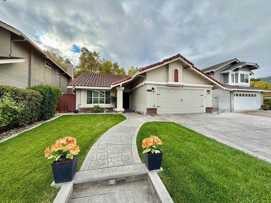 Stunning Single-Story Home in Del Prado! Welcome to this warm and inviting home located in the highly desirable Del Prado neighborhood! You’ll fall in love the moment you arrive as the stamped concrete and beautifully manicured front yard sets the tone for what’s inside. Step through the front door and enjoy the open, bright floor plan with high ceilings and plenty of natural light. Gorgeous laminate floors flow throughout the home. Enjoy preparing meals in the updated kitchen with granite countertops, black stainless-steel appliances, and custom-painted cabinets. Spend cozy evenings by the fireplace or enjoy time with family and friends in the spacious family room. The large primary bedroom features large closet and a beautifully updated bathroom. Two additional generously sized bedrooms and an updated hall bath provide comfortable space for everyone. The peaceful, low-maintenance backyard is perfect for relaxing or enjoying weekend family gatherings. Extra features include OWNED SOLAR, water softener, plantation shutters, newer HVAC and side yard access. Located just steps from two local parks, and close to downtown shopping, dining, and entertainment, this home truly has it all. Easy commuter access makes daily life a breeze! This home is waiting for you!