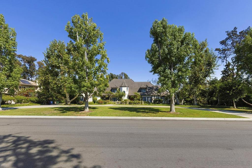 Welcome home to your guard-gated Fairbanks Ranch estate. Greeted with lush greenery and stunning landscaping seamlessly embodied with a large circular driveway leading to your 4 car garage. This palatial estate features 5 BR + 2 additional rooms (giving this home a total of about 6,000 SF) and 5.5 bathrooms. Unique floor plan and soaring ceilings with a first floor master bedroom w/ a master retreat. Separate soaking tub and shower with his and her closets and vanities. Additional flex room/office adjacent with rustic built-ins. Storage is in abundance with numerous built-in spaces and open closets. Timeless living spaces with open spaces and plenty of windows for natural light. The experience does not stop with a one-of-a-kind wet bar just steps away from your formal dining room. Chef's kitchen with wood crafted island and additional sink, Sub-Zero built-in refrigerator, double oven, and stainless steel appliances. Informal dining with a beautiful French door leading to your at home resort with your 1 acre+ lot and meticulously designed pool/spa. This massive family room will blow you away with exposed wood trusses and high volume ceilings. Additional bonus room with a full bathroom perfect for an entertainment room, study room, gym, or you name it! Upstairs features jack and jill style bedrooms, both with access to an oversized balcony, sharing a beautiful full bathroom shower with a classic skylight. The periphery of the second level features two more large ensuites. Washer and dryer included. This estate is plentiful in storage in every corner of the house and features many well-designed and placed doors for convenient access in and out and through. Close access to numerous resorts and country clubs and just minutes from the village at Rancho Santa Fe. Nearby Del Rayo Village Shopping Center with farmers market, shopping at the Village at PHR, 4S Ranch, Del Mar Highlands and One Paseo, or Flower Hill Mall. Access to tennis courts, equestrian center, clubhouse, Fairbanks Lake with miles and miles of hiking and biking trails. Schools in Solana Santa Fe, Earl Warren MS, and Torrey Pines HS/CCA (SDUHSD).