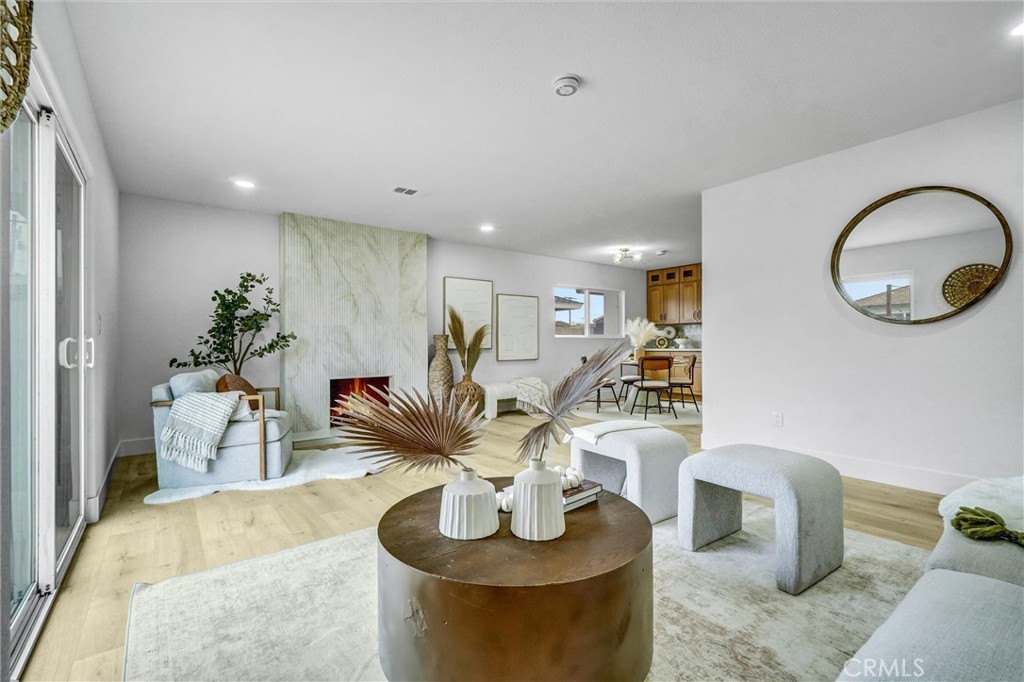 Beautifully renovated home located near the end of a quiet cul-de-sac in Huntington Beach! This stunning residence offers modern upgrades and a bright, open layout. Features include fresh interior and exterior paint, new kitchen cabinets with elegant quartz countertops, recessed lighting throughout, and stylish new light fixtures. Enjoy waterproof laminate flooring, central AC, and a newly finished epoxy garage floor. Nestled in a peaceful neighborhood within the highly rated Huntington Beach Unified School District, this home offers both comfort and convenience. Close to freeways, shopping, dining, and just minutes from the beach — perfect for those seeking move-in-ready living in a prime coastal location!