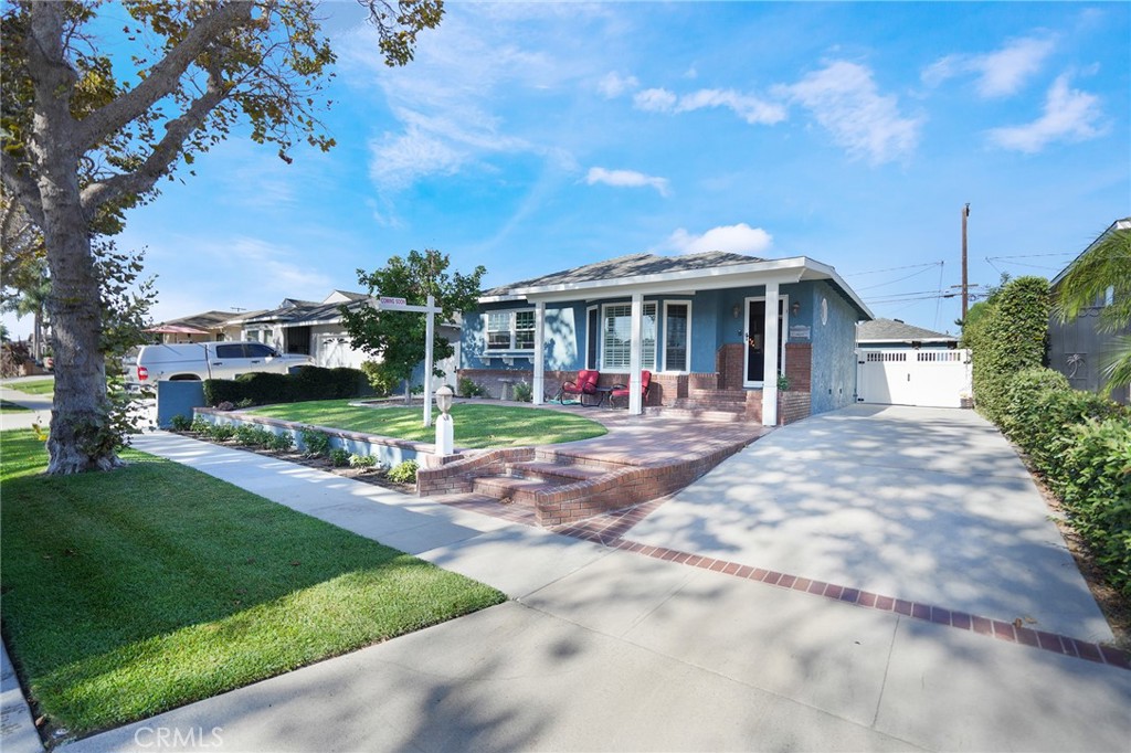 Welcome to this well maintained single-family residence in the city of Lakewood, CA. This 3-bedroom, 2-bathroom home offers a perfect blend of comfort, functionality, and style- ideal for families, professional, or anyone looking to enjoy Southern California living. Step inside to discover a spacious layout filled with natural light, while outside, the custom stonework, backyard patio and spa jacuzzi create a private oasis perfect for entertaining or relaxing under the California sun. A detached and finished garage adds flexibility- whether you need extra storage, a workshop, or even a home gym. The property offers excellent curb appeal and sits on a well-established street just minutes from the freeway, parks, school, shopping and dining.