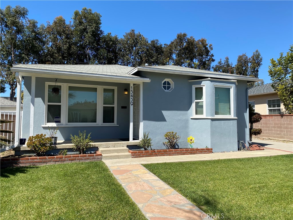Welcome Home to 15439 Harvard Blvd, Gardena CA 90247 - FOR LEASE! This charming and bright 3 bedroom 1 bath home features original hardwood floors, remodeled kitchen with quartz counters, tile backsplash, upper cabinets providing ample storage space, stainless steel appliances (refrigerator, gas range, stove, microwave), dining area with bay windows, separate laundry area with washer and dryer included, living room with large front facing windows which let in plenty of natural light, remodeled bathroom (with updated vanity, subway tile shower, Art Deco style tiled floors), bedrooms with spacious closets and armoire included, wall AC units, and large gated rear yard with detached 2-car garage with EV charging for an electric vehicle. Owner pays for gardening service. Tenant pays for water, electric, gas.