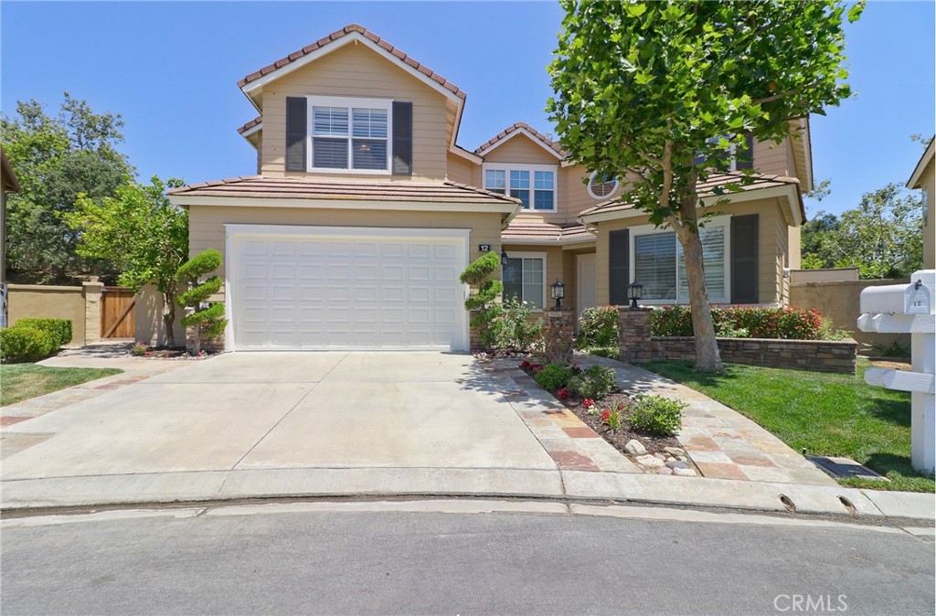 Immaculate turnkey luxury home at the end of a cul de sac, featuring majestic vaulted ceilings, organic natural light and an entertainer's dream backyard. With TWO bedrooms on the first floor and TWO large living rooms, this property exceeds the requirements of today's lifestyle and the convenience of working from home, if needed. The back yard has manicured landscape, pool, spa with waterfall, fire pit, built in barbeque, koi pond and dining area. Brand new luxury vinyl floors cover the entire first floor, staircase and hallways. Recently remodeled kitchen and bathrooms, new light fixtures, fireplace, custom crown molding and baseboards, are just a few of what this home has to offer. The primary en-suit bedroom features a large deck with awning, soaking tub, dual vanities and separate shower. Bonus storage closet off of upstairs laundry. Enjoy all the amenities of the Coto de Caza lifestyle, including golf, tennis and social memberships at one of the finest facilities in Southern California.