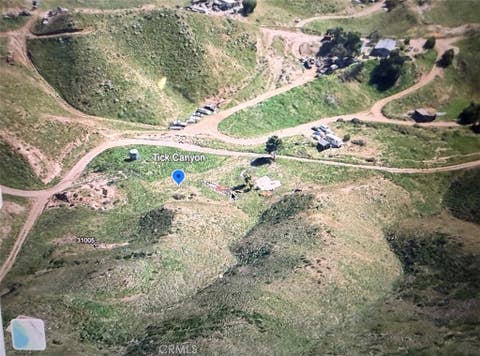 Photo of 0 Tick Canyon Road, approximately Â½ mile south, Agua Dulce, CA 91350 (MLS # SR26158624)