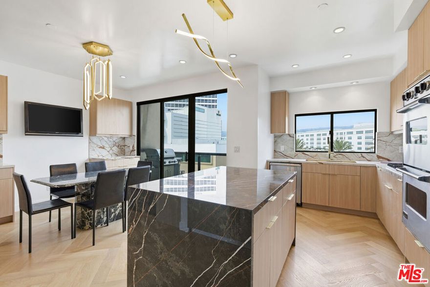 PENTHOUSE CORNER UNIT WITH PANORAMIC CITY VIEWS + PRIVATE ROOFTOP IN A SECURED BOUTIQUE BUILDING Indulge in the ultimate Beverly Hills lifestyle with this extraordinary corner penthouse, a rare offering that combines dramatic panoramic city views, absolute privacy, and an expansive exclusive rooftop deck overlooking the heart of Beverly Hills. Set within a highly secured, upscale building just moments from Rodeo Drive, this one-of-a-kind residence embodies luxury, sophistication, and effortless convenience.Bathed in natural light from its prime corner positioning, the home features soaring ceilings, gleaming hardwood floors, and floor-to-ceiling windows that frame sweeping skyline views from nearly every angle. The open-concept design provides a seamless flow between the formal living room, intimate family room, and elegant dining area, creating an ambiance perfectly suited for upscale entertaining or refined everyday living. A custom-built bar and baby grand piano elevate the atmosphere, while the BRAND NEW renovated gourmet kitchen with a center island and modern, polished appliances transitions beautifully to a private balcony for alfresco moments.Three additional balconies throughout the residence offer serene settings for morning espresso, golden-hour sunsets, or simply taking in the breathtaking views that define this penthouse. A dedicated laundry room, generous closets, and a luxurious walk-in closet add exceptional comfort and functionality. The building itself offers premium amenities including a sparkling pool, rejuvenating sauna, secure key-access elevator, alarm system, and three assigned parking spaces featuring three highly desirable side-by-side garage spots.The show-stopping private rooftop deck is the crown jewel of this magnificent home. Vast, open, and completely private, it delivers unobstructed views stretching across Beverly Hills and beyond an extraordinary outdoor sanctuary ideal for sophisticated entertaining, sunbathing, intimate gatherings, or quiet retreat under the stars.Offered partially furnished or unfurnished (linens, towels, blankets, and kitchen utensils not included), this exceptional penthouse requires a minimum 13-month lease. More than a residence, this is a statement of luxury living at its highest level an unparalleled Beverly Hills experience.