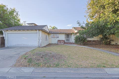 Photo of 9821 Stanford Avenue, Garden Grove, CA 92841 (MLS # PW26160878)