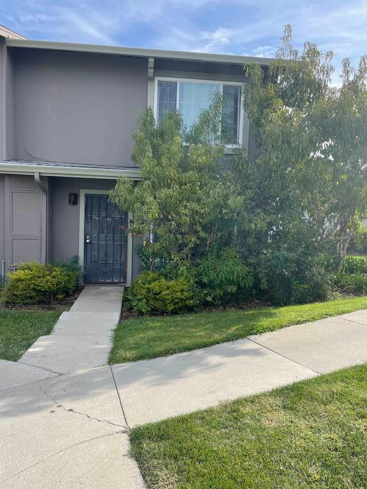 Great Opportunity for 1st time buyers*** End Unit Town Home *** 2 bedrooms *** 1. 5 Baths *** 2 Carport *** Moving condition *** Low HOA*** Near freeways, Stores, Schools. New double panel windows and sliding door.