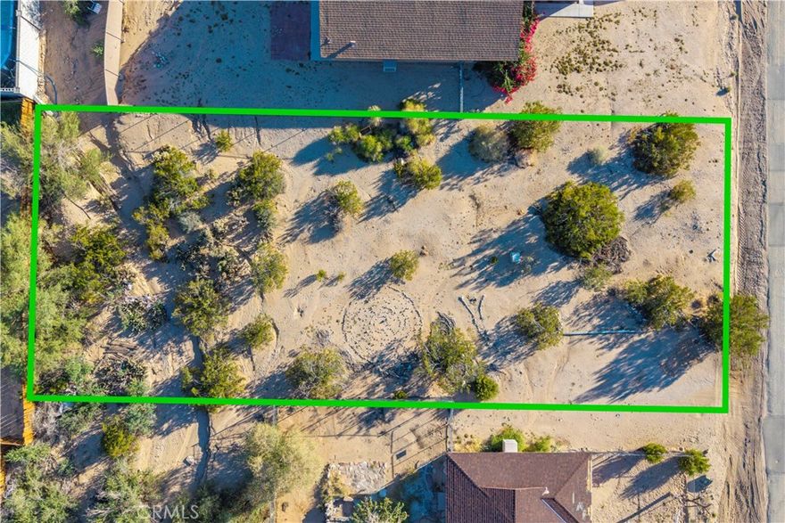 This 9,300 square foot lot offers an excellent opportunity to create your desert retreat or investment property in the desirable Smoketree neighborhood. The parcel sits in a peaceful residential area surrounded by natural desert beauty and lovely mountain views. Utilities are believed to be available at the street—buyer to verify.
Located just minutes from Joshua Tree National Park, the 29 Palms Art Gallery, and Tortoise Rock Casino, this area offers easy access to local dining, music, and community events. Experience the charm of the Hi-Desert lifestyle where creativity, nature, and small-town spirit come together.