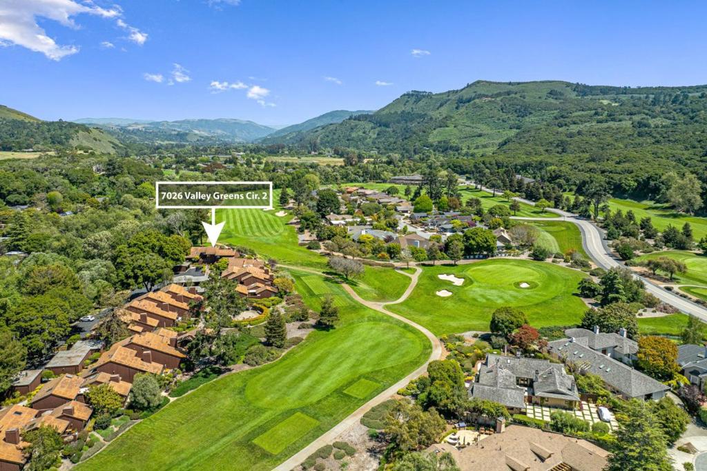 Live the ultimate California lifestyle in the sunny Quail Lodge community of Carmel. Showcasing spectacular golf course views, this updated condo is considered a premium unit. The condo's interior is thoughtfully designed to maximize comfort & functionality. Boasting the largest floor plan with 3 en-suite bedrooms & expansive views of the 9th hole, with the Santa Lucia mountains as a backdrop. Whether you're hosting visitors or enjoying a quiet evening at home, this condo provides the perfect setting for every occasion. The living area flows seamlessly into the dining space, creating an inviting atmosphere for gatherings. Large sliding glass doors open to the back patio, where you can dine al fresco while taking in the serene views. The outdoor space is a private oasis, ideal for enjoying the mild Carmel climate & picturesque sunsets. Lifestyle enthusiasts will enjoy all the local activities; golf, tennis, pickleball, hikes, biking, surfing, beaches, shopping, dining, & wine tasting.