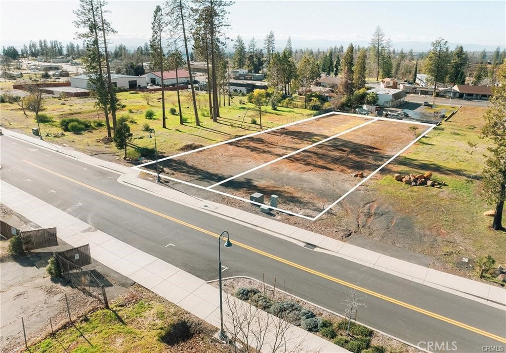 Prime Development Opportunity in the Heart of Downtown Paradise!
Seize this rare chance to own one of the largest available Central Business (CB) zoned parcels in the thriving Downtown District of Paradise! These nearly flat, equally sized lots are being sold together, offering approximately 110 feet of Almond Street frontage—a prime location surrounded by well-established businesses.
With CB zoning, the possibilities are endless—whether you envision a restaurant, retail shop, office space, or mixed-use development, this central location is ideal. Just a short walk from the popular Train Depot Park, which hosts farmers markets, concerts, and community events, your business will benefit from a steady flow of foot traffic.
Nearby businesses include Starbucks, Les Schwab, popular restaurants, and more, adding to the vibrancy of this sought-after area. Sidewalks, streetlights, and small-town charm make this a fantastic investment for those looking to build in a community-focused town with a bright future.
Don’t miss out—explore this exceptional opportunity today and bring your business vision to life in beautiful Paradise!