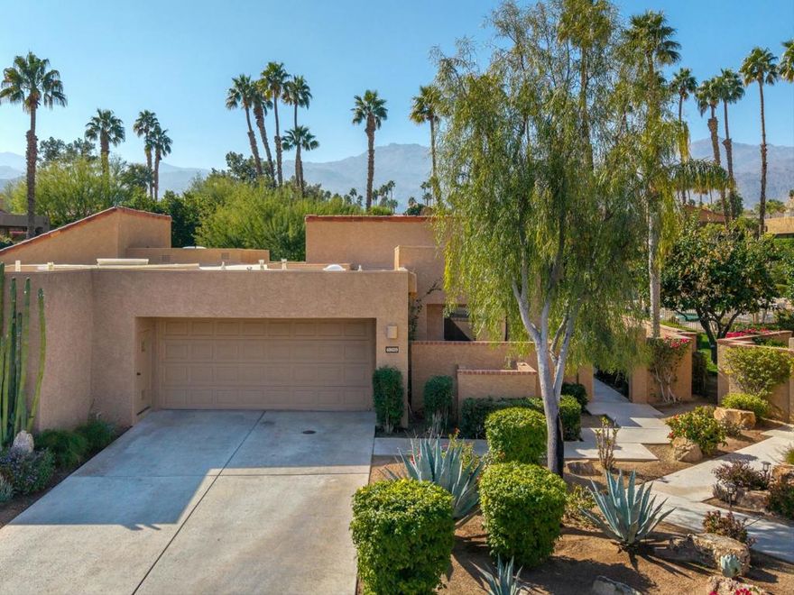 Charm meets convenience in this delightful condo. Step into warmth and comfort in this open floor plan. Welcome to your sanctuary! This home boasts sleek modern finishes and abundant natural light that dances through the generous windows--nestled in the vibrant community of Ironwood Country Club which is your gateway to a dynamic lifestyle of Country Club living. With views of the mountains and pool, the mood is relaxed. Cozy up to the fireplace with a glass of wine from the bar. Ceramic wood tile floors throughout make living easy. This home consists of two bedroom en-suites. a newly pebble-tec two-car garage makes cleaning a breeze. Make sure you put this one on your list.