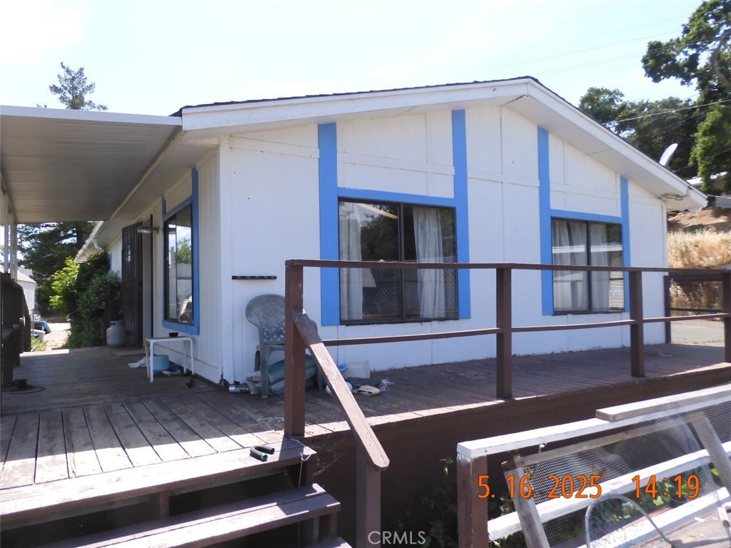 This property is a great opportunity for a person looking to have a lake home on the water. Property sits on Stubbs Island closest to the entrance to Clear Lake. Availiable for new owner to build a awsome dock for their boat and their new fun area. Fish right off your large deck. Many large Catfish caught off the deck in the past. Other fish also. Clear Lake is one of the best Bass trophy Lakes in the country No need to drag your boat around just park it at the dock. Good size Manufactured home. Needs TLC a good cleaning would bring it around nicely. Best thing there are NO HOA fees, you own the lot. Rare for water frontage properties. Lots of open parking room for boat storage. This is a private area in the Clearlake Oaks area. 2 Bedroom 2 full Bath home. Large living room, formal dining. Kitchen has breakfest bar. Indoor laundry with storage area. A must see.