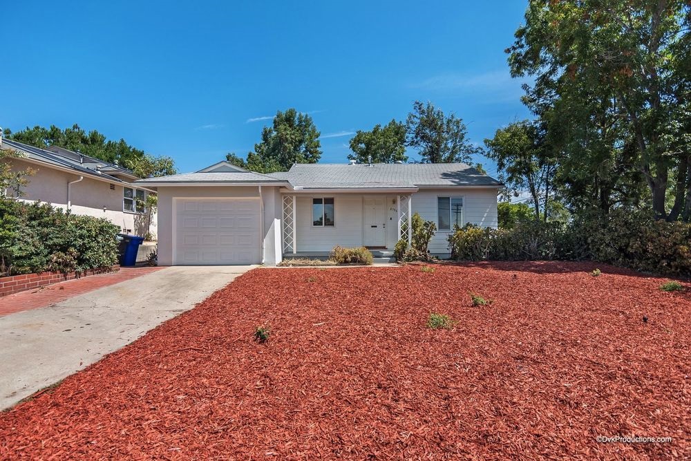 Look NO further! This is the home for YOU! COMPLETE REMODEL includes ~ Beautiful refinished original hardwood floors, SS appliances, quartz counter tops and tile floors in kitchen. Bathroom features beautiful tiled floor and shower, new toilet, sink, lights and fixtures. New light fixtures, ceiling fans. Fresh paint inside and out. New baseboards throughout. New roll up garage door. Home sits on a large corner lot. Bring your ideas and design your new front and back yards. FANTASTIC NEIGHBORHOOD! Neighborhoods: La Mesa Equipment: Dryer, Washer Other Fees: 0 Sewer: Sewer Connected Topography: LL