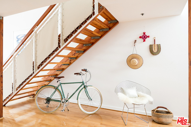 Imagine living and/or working in this bright, open top floor loft in the heart of Venice, designed by William Dale Brantley of aArts. Tippy, top floor on a valuable corner location, providing maximum light to bathe the interior spaces through out the day. Commercial grade construction overseen by the original developer providing a peaceful oasis in the heart of Venice. The space is lofty, yet homey with warm wooden floors throughout plus a chef's kitchen open to the living area encompassing the entire first level. The upper level provides the private sleeping, bathing and rejuvenation. Every day option to enjoy ocean breezes from your own and oversized roof deck. This loft doesn't compare to others - it is in its own league.