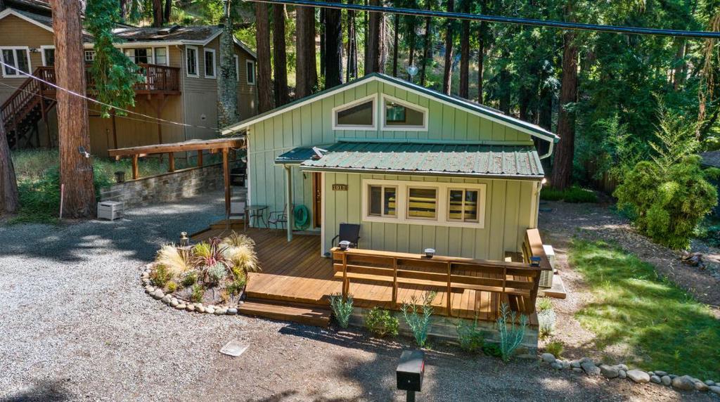 MUST SEE Redwoods Retreat! Tucked among the towering trees, this freshly painted home (interior and exterior) blends rustic charm with modern upgrades. Features include hardwood floors, granite kitchen, updated bath, air conditioning, automatic blinds, full-house generator, water softener, and a newer metal roof. Front and back decks offer serene spaces to relax or entertain. Enjoy the peace of Boulder Creek with the convenience of being minutes to town. Priced to sell at $729,000.