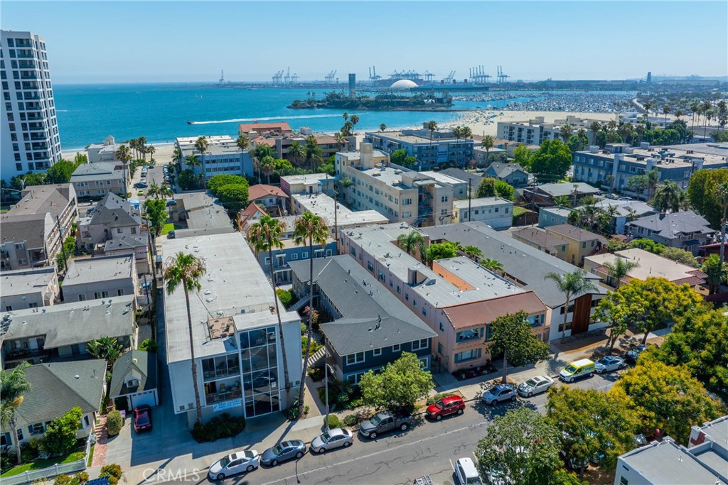 LOCATION!!!LOCATION!!!LOCATION!!! One block away from the beach, this charming corner cottage features 2 bedrooms and 1 full bathroom, offering an open floor plan and spacious living. From the moment you walk in, you feel the vacation has begun! Enjoy all the walking, jogging and cycling trails. Close to Shoreline village, the famous Queen Mary, Downtown, Long Beach Convention Center, Aquarium of the Pacific and many many more exciting and fun amenities. Lots of close by shopping, dining and entertainment. Great for a starting family, second vacation home or rental income investment opportunity. A MUST SEE!!!