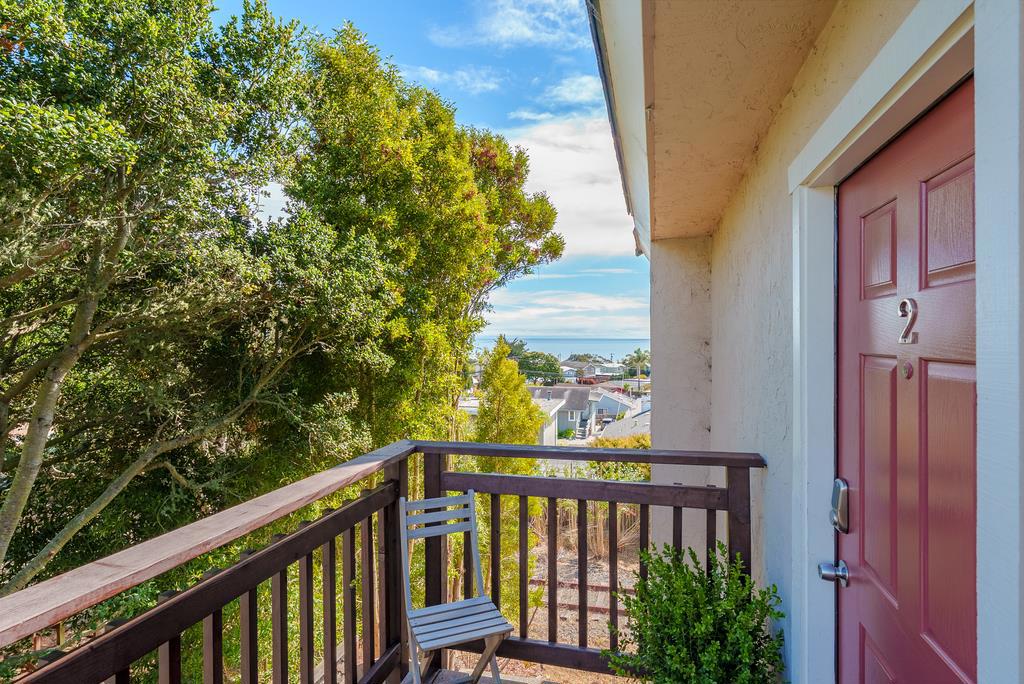 This ocean-view condo in the heart of Seacliff delivers a lifestyle most dream of-panoramic views that outshine many hillside homes, just steps from the sand and neighborhood favorites like Mariannes Ice Cream and Manuels. Here, you get the feel of beachfront living without the price tag, in a community where neighbors still know one another and kids walk to top-rated schools. Mornings begin with sunrise over the water, afternoons drift into beach walks or local gatherings, and evenings settle into the glow of coastal sunsets from your own deck. It's a rare blend of natural beauty, convenience, and community; everyday life shaped by the rhythm of the ocean.