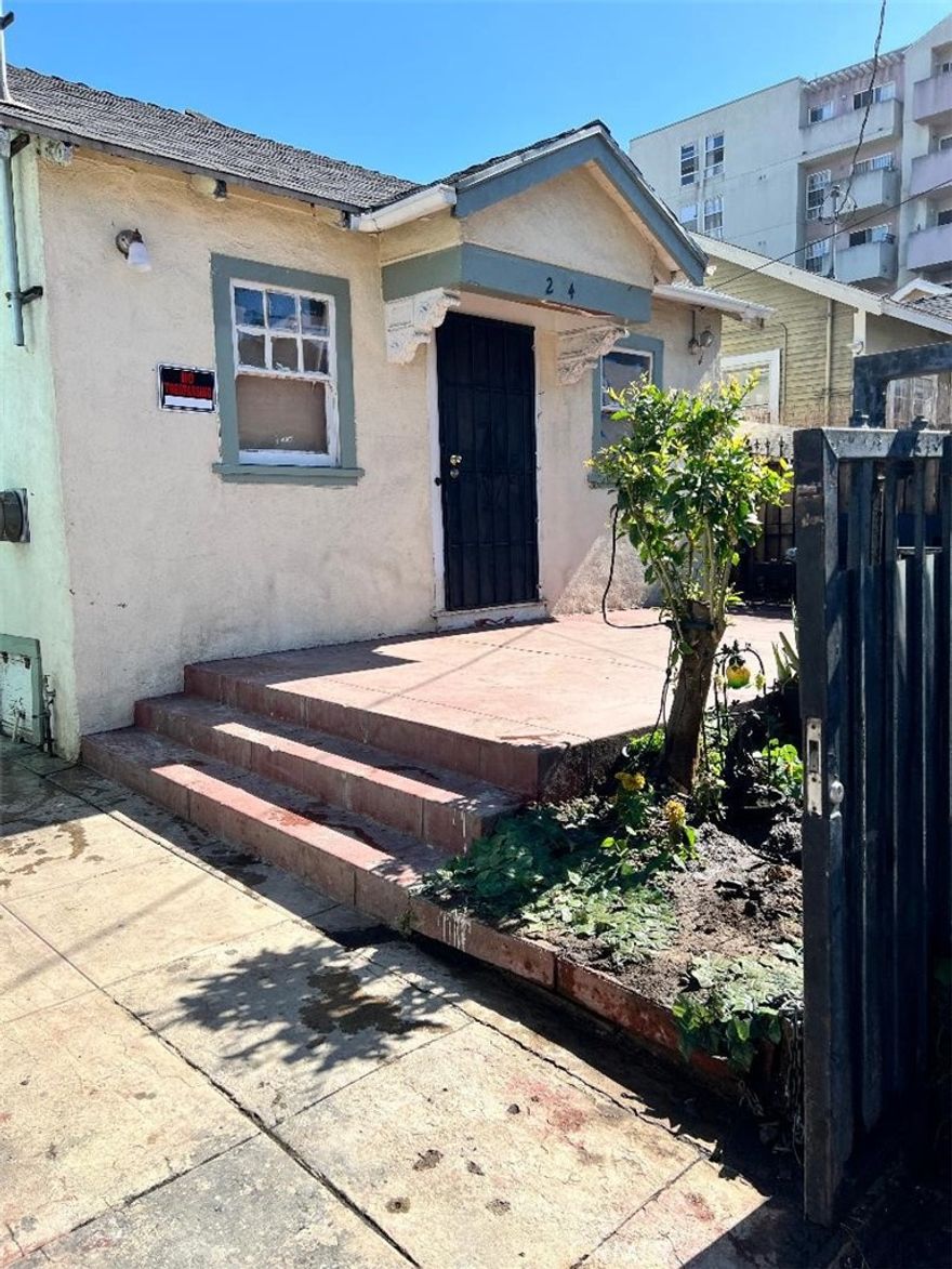 Looking to live in the heart of Los Angeles and be in the center of all the action and nightlife? This charming two-bedroom, one-bath home holds the potential to be transformed into a modern sanctuary. Located in a prime location near the city’s most vibrant attractions. Just steps from Vista Hermosa Park and the Echo Park indoor swimming pool, and minutes from Echo Park Lake, Dodger Stadium, Olvera Street, Disney Hall, world class museums, and the Staples Center. Enjoy being close to the trendy Echo Park community, known for its unique shops and dining. With convenient access to the 110, 10, and 101 freeways, this centrally located property provides easy connectivity to Downtown Los Angeles and beyond. This property has a great layout with plenty of natural light.  Perfect for a savvy buyer to supplement their income from the smaller unit. The real charm lies in the possibility to build up and create a space that offers breathtaking views of Downtown Los Angeles Skyline.  The possibilities are endless, build your dream home or build your own income property.