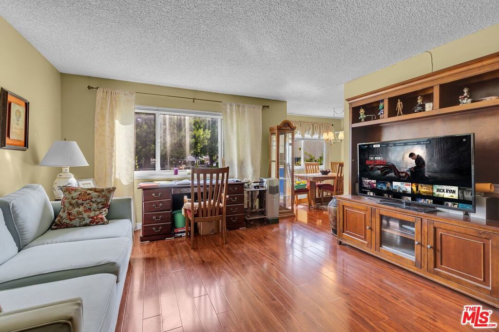 Peaceful & Secure 55+ Senior Co-Op Ideal for Your Loved One! Discover the perfect place for your parent or loved one to call home in this charming ground level unit located in a quiet, well-maintained 55+ senior co-op. Tucked away in a lush, park like setting, this small, 60 unit complex offers the safety, serenity, and community that bring peace of mind to both residents and their families. Inside, the one bedroom layout is smartly designed with plenty of closet space and easy access throughout. Climate control is included in the HOA dues, keeping utility costs predictable and ensuring year-round comfort. The HOA also covers water, trash pickup, property taxes, and access to a solar-heated pool. Truly low-maintenance lifestyle. Additional highlights that make this a smart choice, Designated carport space & guest parking. Secure automatic gates for added safety. Two conveniently located laundry rooms. Private garden space for outdoor enjoyment. Pet friendly, bring along a small companion. The seller is open to selling furnished or unfurnished, depending on your needs. Just pack a bag or bring your own furniture. Flexibility like this makes for a seamless move and transition. Please note, This is a cash-only purchase, and leasing is not allowed ensuring a stable, long-term community for all residents.