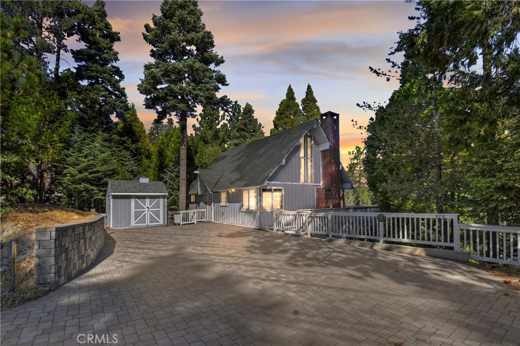 Level-entry to this immaculate mountain home with Lake Rights, on plowed & maintained road and with plenty of level parking AND a bedroom/bath all on the main level.. Wow, this house has exactly what we need: Level parking, Level-entry, bed &bath on main level, plowed road, Lake-rights AND comes "turn key", that's right... fully furnished, decorated & equipped right down to linens, pots, pans, silverware... How nice is that! Move in ready with newer kitchen, flooring, paint, plumbing, water heater, SS appliances, heater and A/C (Yes, we have central A/C !). Open floor plan with vaulted wood-beamed ceilings is great for gatherings or just hanging out. Upper level is cool loft for the kids. Below is another bedroom & bath and then a game room or 3rd bedroom . Newer window coverings and dual pane windows for year-round comfort. Generous lot (over 1/4 acre) and useable too. How about we add in a laundry room for inside laundry (not down in the dungy old basement). It gets even better... Owner has a dock over at the village that is available to be purchased for extra money. Definitely checks all the boxes and a great price as well.. dont laugh but this house is available for $303/sq' which is way below the market average for Arrowhead Woods...Just ask your Realtor to show you the current sale prices/sq' according to their Real List market trends! Anyways, come on up and see for yourself!