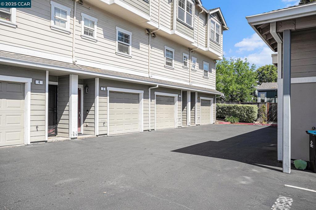 Rarely available townhouse in Ashford Place! Small community with an appealing environment. No Rental Restrictions. Tastefully updated throughout, featuring a light & bright open floor plan, freshly painted interior and newer carpet. Spacious kitchen with custom granite countertops, gas stove, newer built-in microwave, breakfast bar, pantry and extra-large stainless steel sink. Each bedroom has it's own en suite bathroom with walk-in closet and ceiling fan. Both bathrooms have updated vanities with granite tops, tile floors, tile shower walls and glass shower sliding doors. There is a half bathroom convenient for guests which was also updated. Attached 2 car, tandem garage has lots of storage. Other features include central heating and air conditioning, washer and dryer, double pane windows and a patio right outside the sliding glass door. Walk to shopping and restaurants. Easy commute location to highway 4 and 680, bus stop and minutes to BART or Amtrack. Live in one bedroom and rent out the other...No Rental Restrictions, see HOA documents for details.