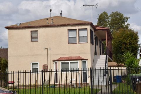 Photo of 1945 W Vernon Ave, Los Angeles, CA 90062 (MLS # PW26047544)