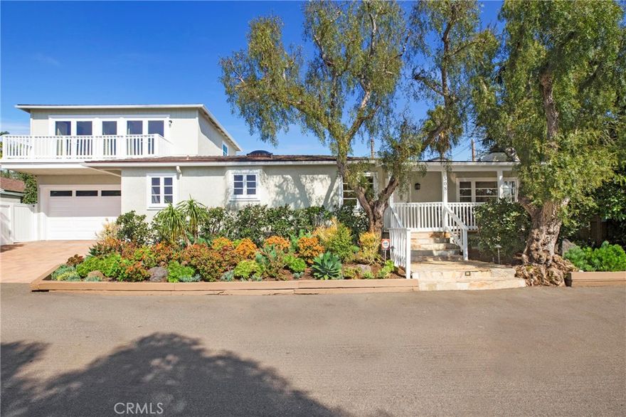 Ideally located in one of the most desirable neighborhoods at the heart of the Laguna Beach Village, this charming oversized cottage offers panoramic ocean and Catalina views on an extremely private lot. From the moment you walk in the front door, you will be immersed into the natural light-filled living room that showcases a large skylight and gas fireplace. The pristine 4 bedroom, 3 bath features a primary bedroom suite, as well as two other secondary bedrooms and bathroom, on the main level.  Upstairs there is a large flex room that can be used as a primary bedroom, den, or game room that boasts brand new French doors with incredible Pacific Ocean / Catalina views.  Wood floors enhance the entire home, while the updated galley kitchen, laundry closet and dedicated work space make first floor living easy.  The attached 2-car garage is complete with built-in storage and tall ceilings. There are 2 additional spots for parking in the driveway. The home is bordered by a view porch in the front to enjoy the ocean breezes and a smaller, discreet porch located in the back off one of the secondary main floor bedrooms. The beautiful, mature landscaping accentuates the cozy and private elements of this property and generous side yard while amplifying the seamless indoor / outdoor lifestyle Southern California is known for.  Its close proximity to beaches, downtown dining and shopping are some of the true benefits of living in The Laguna Village.  Don’t miss the opportunity to make 508 Seaview your private treasure.