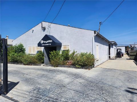 Photo of 10943 Schmidt Rd, El Monte, CA 91733 (MLS # DW26077956)