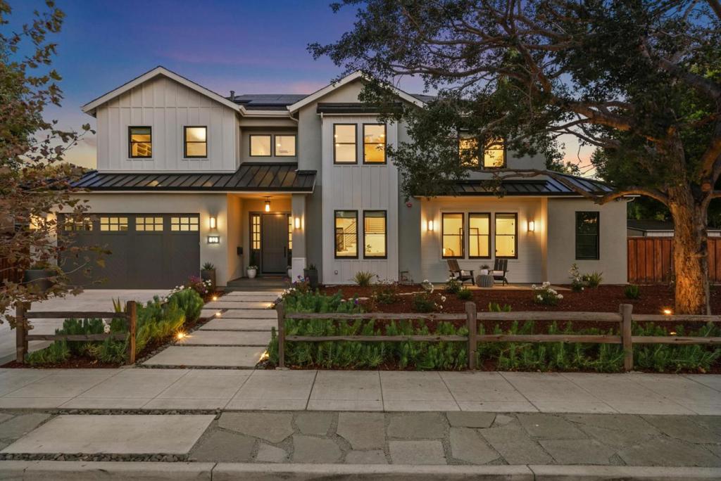 Embrace the timeless allure of Willow Glen, redefined with contemporary sophistication in this jaw dropping 2021 custom-built home, sought after floor plan boasts 6 bedrooms, 5.5 bathrooms, with an En-suite Bedroom plus a Guest Bedroom on the first floor, and a Primary Suite and 3 Guest Bedrooms and a loft area on the second floor, plus a versatile second family room that can be used as future ADU/game room, 4,515 sq.ft., perfectly designed for family gatherings, plus an oversized attached 2-car garage 494 sq.ft., just steps from Downtown Willow Glen's shops, dining, and lively community events. Showcasing wide plank wood floors, a striking herringbone entry, shiplap accents, and hand-blown glass chandeliers. The chefs kitchen features Thermador appliances, an oversized island with hidden storage, and high-end cabinetry. A serene primary suite offers radiant-heated floors, frameless shower, custom closet, and a private balcony retreat. Expansive bifold doors connect seamlessly to the backyard with motorized pergola louvers, outdoor BBQ bar area with sink, firepit, Sonos audio, and steel-reinforced privacy walls. Tesla solar (9.2 kW), PowerWall, EV charger, Lutron smart lighting, Hunter Douglas shades, whole-home Sonos elevate convenience and efficiency.