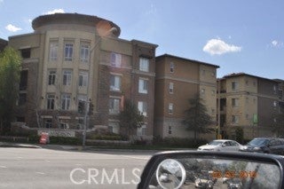 Photo of 24535 Town Center Drive #6210, Valencia, CA 91355 (MLS # SR26197679)