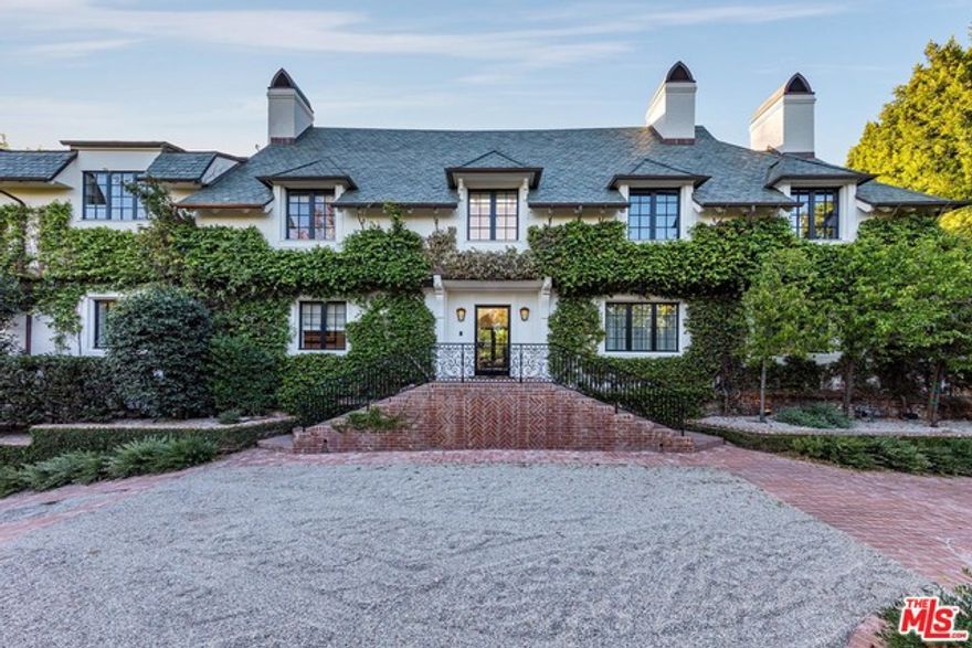 Once in a lifetime opportunity to acquire one of the most spectacular homes in Beverly Hills, the perfect blend of Old Hollywood completely updated and remodeled with 2019 state-of-the-art amenities. Located in the most exclusive section in the best part of Beverly Hills, completely private, secluded, and behind gates, the home has been completely remodeled by one of the top designers in the world. Featuring a grand 2-story entry, 50 ft living room, formal dining room with bar, gourmet kitchen that opens to family/media room, Chef's kitchen, screening room, gym, and guest house. An absolutely spectacular property featuring park-like grounds, rolling lawns, a swimmer's pool, tennis court, putting green, and outdoor kitchen/pizza oven. Perfect for major entertaining. Shown to pre-qualified clients only.