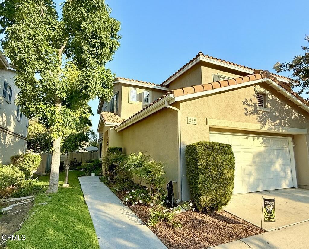 Bright & Spacious Los Arboles End-Unit Townhome; This beautifully updated 3-bedroom, 2.5-bath townhome offering 1,537 sq ft of living space in the desirable Los Arboles community. Perfectly situated as a corner end unit, this home is filled with natural light and thoughtfully designed upgrades.From the entry, you're greeted by an expansive living room with rich wood floors, crown molding, and an open flow ideal for entertaining. The bright, updated kitchen showcases crisp white cabinetry, stainless steel appliances, and recessed lighting, seamlessly connecting to the dining/family area with a cozy fireplace and sliding doors that open to a private, gated patio oasis.Upstairs, each bedroom offers ceiling fans and plenty of space, while the primary suite impresses with dual closets (including a custom walk-in) and a spa-inspired bath with dual vanities, a soaking tub, and separate shower.Additional highlights:Dual-paned windows & plantation shutters throughoutExtensively upgraded 2-car garage with cabinets, racks, workshop space & recessed lightingCommunity amenities: pool, playground, RV parking, and moreConveniently located near shopping, dining, freeway access, and Camarillo High SchoolThis is not just a townhome--it's a lifestyle upgrade. Don't miss the chance to make this Los Arboles gem your own!
