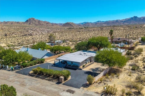 Photo of 61833 Alta Mesa Dr, Joshua Tree, CA 92252 (MLS # JT26230047)