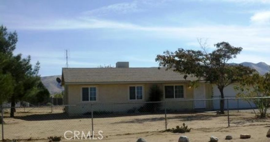 Charming 3-bedroom, 1-bathroom ranch-style home on a spacious nearly half-acre lot! Perfect for first-time buyers or those seeking a cozy retreat, this  home features an open layout, ample natural light, and a versatile floor plan. Enjoy the convenience of an attached 2-car garage and the potential of a large lot, ideal for gardening, entertaining, or future expansion. Nestled in a peaceful setting, this property offers the perfect blend of comfort and opportunity.